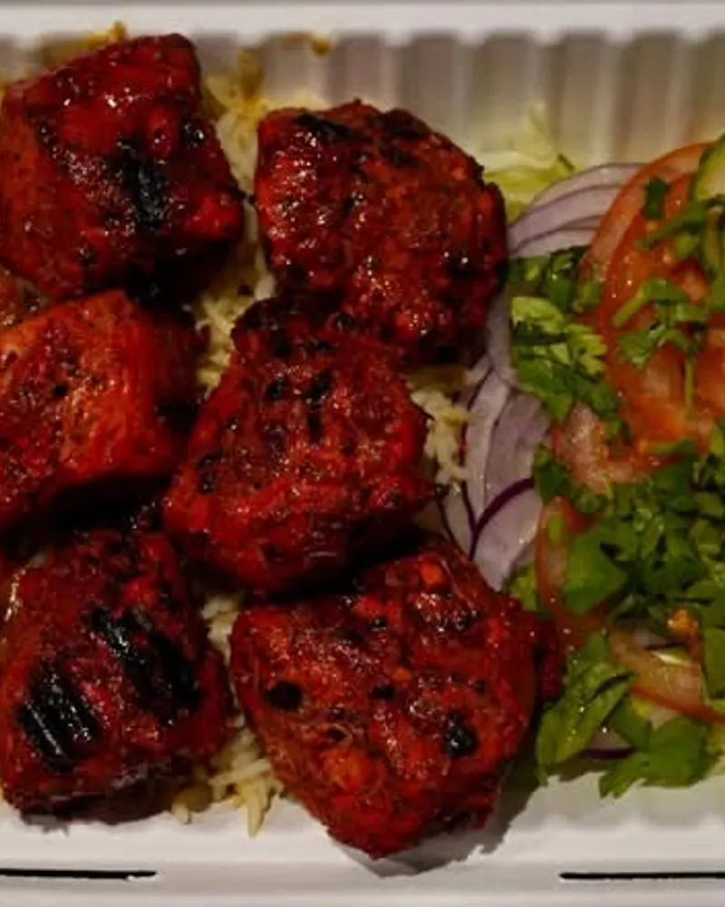 Chicken tikka rice box, freshly grilled at the kiosk